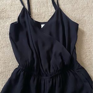 Black spaghetti strap jumper.